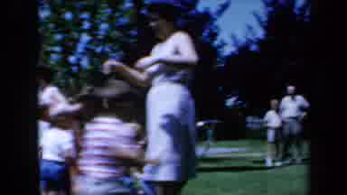 California USA (1961): Family Having A Fun Backwards Race At Their Reunion
