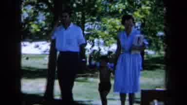 California USA (1961): Mom Dad And Son Walk Holding Hands Coming To Two Other