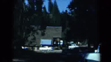 California USA (1969): Cars Fill Parking Lots And Line The Side Of The Roads Near