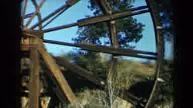 California USA (1969): Single Man Walks Toward The Top Of A Mill In A Rural Area