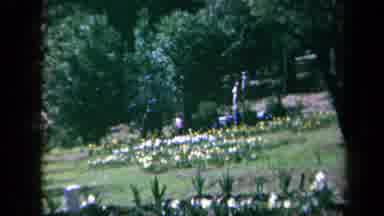 California USA (1969): Little Kids Playing And Running In A Field With Pretty