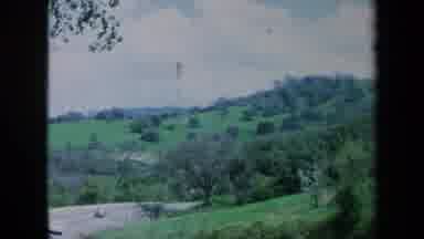 California USA (1969): Green Hill In The Spring With Slight Wind And A Road With