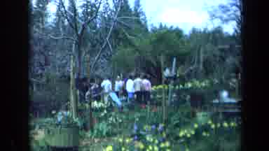 California USA (1969): A Large Number Of People Outside In A Garden And Then The