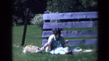 California USA (1969): A Woman Plays With A Dog