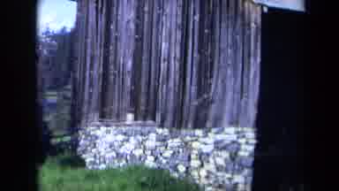 California USA (1969): Rock Fence Trees Child Riding Bike Green Grass Tall House