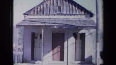 California USA (1969): Old Fashioned Wooden House With White Fence And Trees In