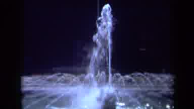 California USA (1969): Zooming Into A Beautiful Water Fountains Top Spout Of Water