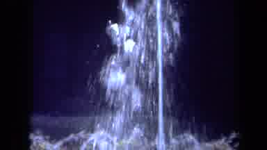 CALIFORNIA USA-1969: Water Fountain Spraying Jets Of Water Into The Air At Night