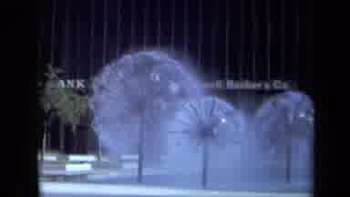California USA (1969): Three Circular And Artistic Water Fountains In Front Of A