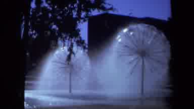 Sacramento California USA (1969): Giant Sprinklers Spraying Water In The Middle Of