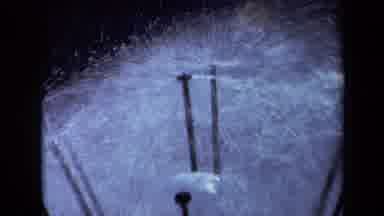 Sacramento California USA (1969): Several Black Sprinkler Systems Raining Down A
