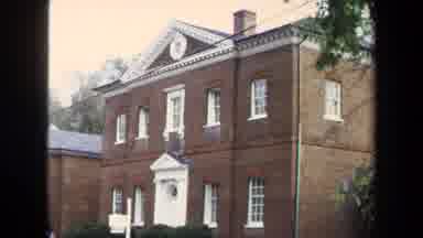 Annapolis USA (1970): A Two-Story Red Brick House Containing A Museum Has A Sign