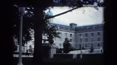 Annapolis USA (1970): A Giant White Building That Has Green Light Poles And