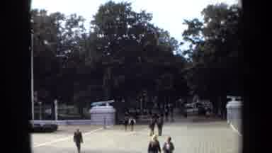 Annapolis USA (1970): People Dressed Up In Suits And Dresses Walking To Their