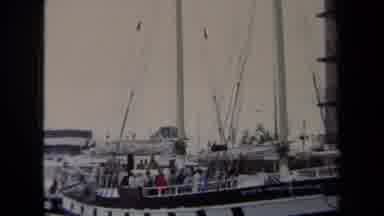 Annapolis USA (1970): A Few People Are Standing On A Boat Near A Dock