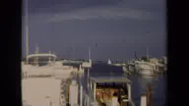 Annapolis USA (1970): Zoom Into Moving Boat In The Water Zooming Out To A Broad