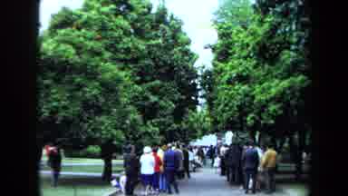 California USA (1970): In The Garden The Persons Are Form In Queue There The