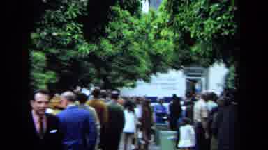 California USA (1970): Large Gathering Of People Focused On The Moon Landing By