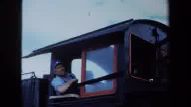 California USA (1970): Passengers Aboard Train Awaiting Departure