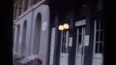 Washington DC USA (1970): Man With White Button Up Shirt Leaving The Building