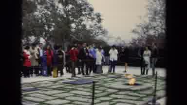 Washington DC USA (1970): People Gathered Around A Gravestone And Fire Pit For A