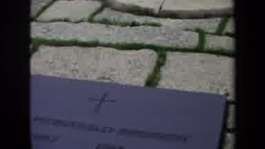 Washington DC USA (1970): Cobblestone Flooring Panning To A Burning Flame Emerging