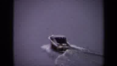 Washington DC USA (1970): Speedboat Traveling Towards Tall Bridge On Open Waterway
