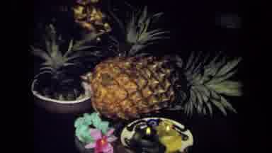 California USA (1971): Pineapple And Candles With Flowers As A Centrepiece In