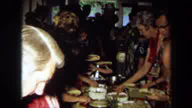 California USA (1971): Two Lines Of People Putting Food On Paper Plates From The