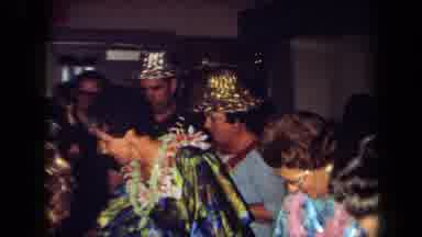 California USA (1971): Flowers Colorful Hats Ladies Lay Party Glasses Blue Shirt