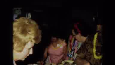California USA (1971): Some Old People Dressing Colourful Clothes Putting Food In