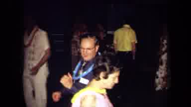 California USA (1971): A Group Of People At A Convention Trying Out A New Dance