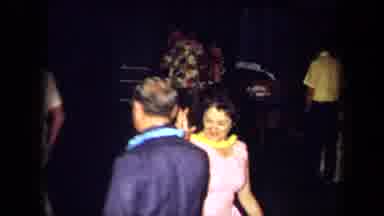 California USA (1971): Couples In Leis Spinning Around Whilst Dancing And Swapping