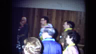 California USA (1971): Several Happy People Dancing At A Party With A Hawaiian