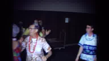 California USA (1971): People Partying With Hawaiian Necklace