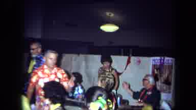 California USA (1971): Middle Aged People Celebrating At Party Wearing Traditional