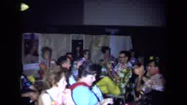 California USA (1971): Group Of Older Adults As A Hawaiian Party Wearing Leis And