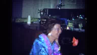 California USA (1971): Friends And Family Gather Together For Food And Drink In
