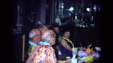 California USA (1971): Hawaiian Party In Restaurant Celebrated By Older People A