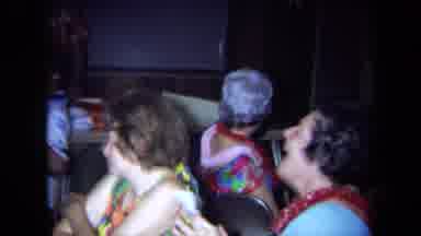 California USA (1971): Women At Gathering Having Fun Pointing Laughing Joking