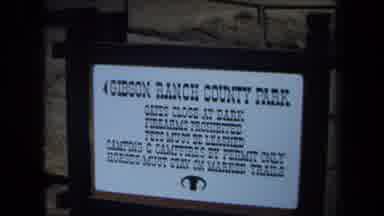 California USA (1971): Sign For Gibson Ranch County Park Followed By Two Donkeys
