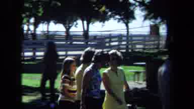 California USA (1971): Four Friends Strolled Through The Park Eying An Odd Game Of