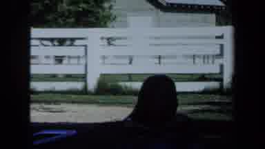 California USA (1971): Families Roam Around Outdoor Area Next To White Fence And