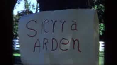 California USA (1971): Paper Sign Reading Sierra Arden Posted To A Tree In A Yard