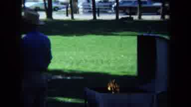 California USA (1971): Grilling And Drinking Beer With A Group Of Guys On A Sunny