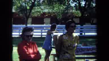 California USA (1971): Three Women Talking And Other People Nearby At A Picnic