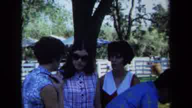 California USA (1971): Lots Of People Together Talking Outdoors