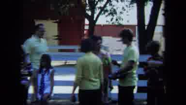 California USA (1971): People Gathering To Watch Children Play Croquet At A Farm