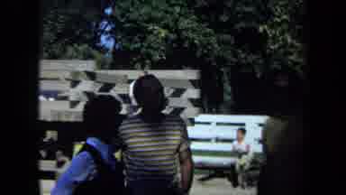 California USA (1971): Playground Family Vacation With People Talking And Climbing