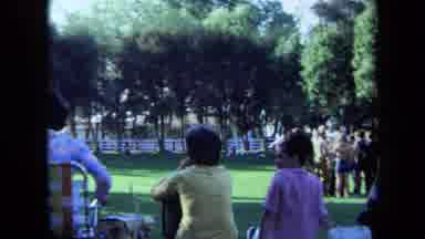 California USA (1971): A Group Of Family Members Having A Good Time At A Big
